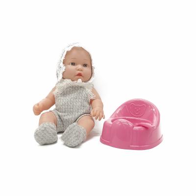 China Vinyl Doll Fashion Silicone Baby Dolls with Milk Bottle and Bowl Spoon for sale