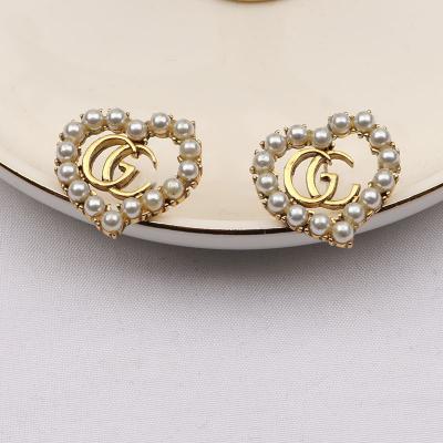 China Wholesale Vintage Letter Circle Earrings Shape Gold Stud Earrings For Women Jewelry for sale