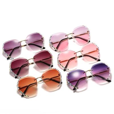 China Famous Luxury Brand Design Diamond Square Sunglasses Women Vintage Fashion Eyewear Sexy Oversized Rimless Sunglasses For Female for sale