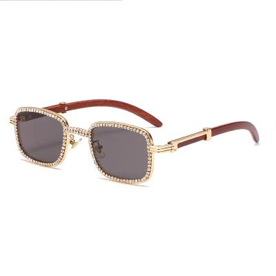 China Luxury Designer Crystal Sexy Frame Rhinestone Eyewear Brand Glass Diamond Cat Eye Sunglasses Women Semi-Rimless Sun Fashion Sunglasses for sale