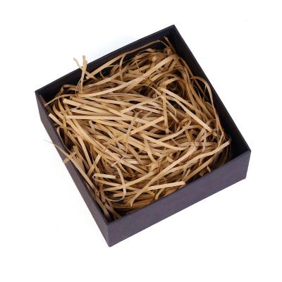 China High Quality China Red/Tan Kraft Paper Shredded Paper Filler Colorful Gift Basket Fold Cut Shredded Paper for sale