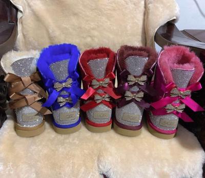 China 2020 Winter Warm Wome Boots Faux Stone Sheepskin Sheepskin Outdoor Anti-Slippery Fur Striped Snow Glitter Boots for sale