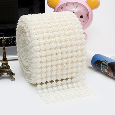 China Durable New 10 Rows Plastic Pearl Trim Mesh Rhinestone Ribbon For Wedding Home Textile Decoration Clothing Accessories for sale