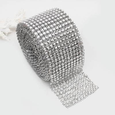 China Durable Arbitrary Cutting 12 Rows Sliver Plastic Rhinestone Mesh Trimming Rhinestone Net Mesh Fabric For Making Dress Cloth for sale