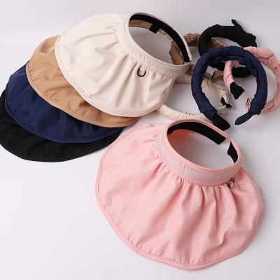 China Fashionable Hot Sale Dropshipping Hood Hats Foldable Magic Hair Band Shell Hat For Women for sale