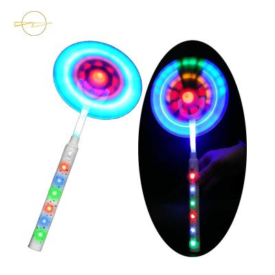 China ABS+PVC Light Up Windmills Flashing Light Up Handheld LED Lights Toy Music Spinning Windmill Amazing Novelties Gift For Kids for sale