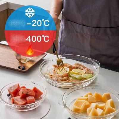 China Heat Resistant Round Glass Microwave Oven Special Platefor Sustainable High Borosilicate Bakeware For Household for sale