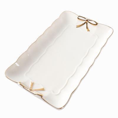 China Creative ZC Europe ZC style OEM style jewelry storage tray luxury ceramic fruit dish European light candy gilt bowknot for sale