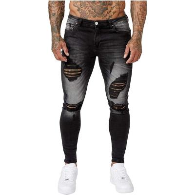 China Moq QUICK DRY Distressed Destroyed Custom Bottom Ripped Slim Stacked Denim Rock Skinny Jeans Men for sale