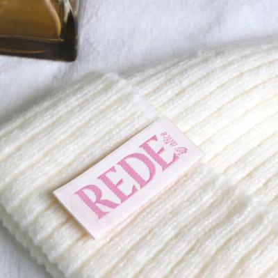 China Viable high quality custom brand label for clothing fabric pink woven label main logo woven neck label for sale