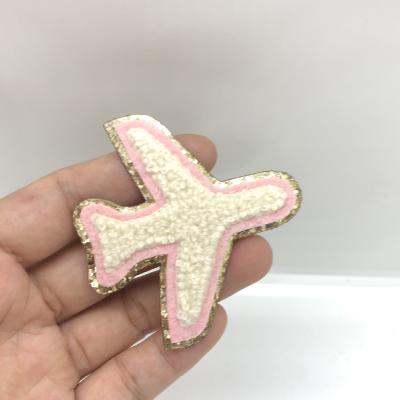 China Long Lasting Hot Wholesale Custom Glitter Chenille Airplane Iron On Patch for sale