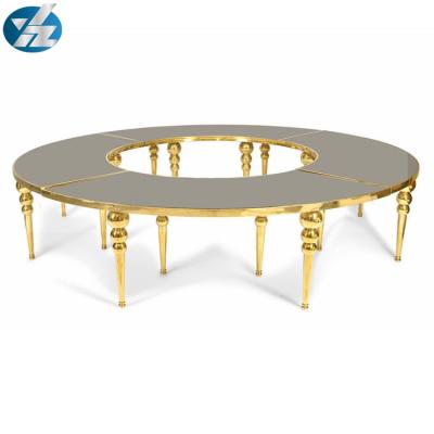 China Modern round golden dining table set in s-shape for sale