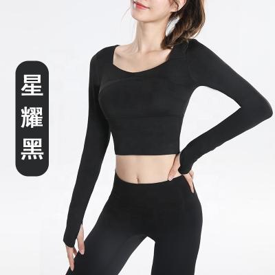 China Xingyao Breathable High Quality Black Ribbed Yoga Long Sleeve Black Crop Top Yoga for sale