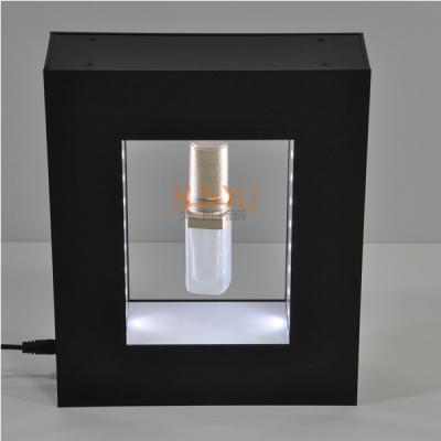 China Black Advertisement Display Stands , Perfume Floating Rotating Display Stand for sale