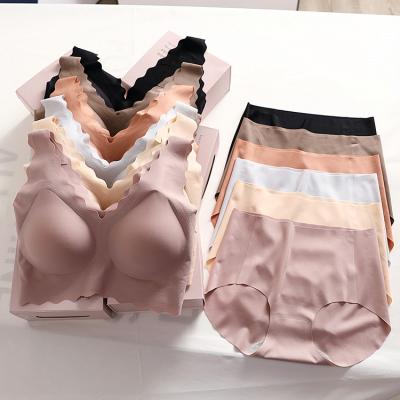 China Beautiful back young girls sleep wireless female traceless Japanese silk one piece air bra and hippie panties seamless teen set for sale