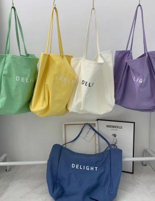 China Large Capacity Folding Green Letter Tote Canvas Bag Canvas Printing Shopping Bag Korean Version for sale