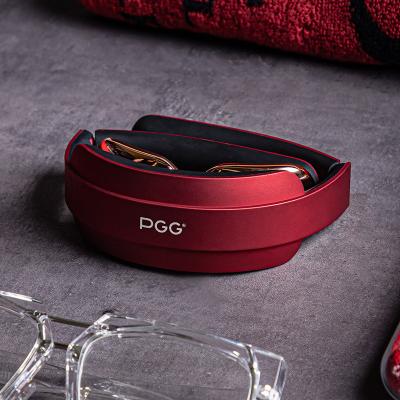 China A massage device small enough to fit in your clothes pocket. Wireless Desktop EMS Pulse PGG Electric Neck Massage Heating Portable Cervical Massager for sale