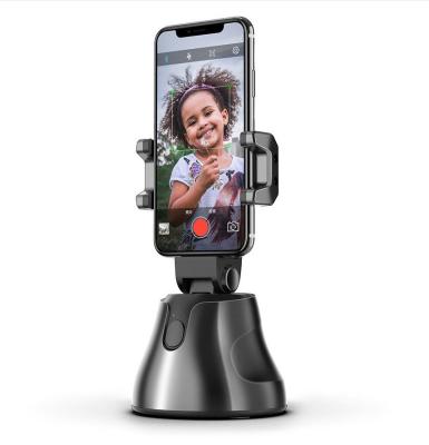 China 2020 ABS Auto Portable Apai Geniuses Robot 360 Selfie Stick With Phone Holder For Video Smart Shooting for sale