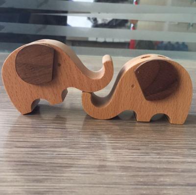 China Home Wood Pen Holder Simple Design Wooden Elephant Desktop Mobile Phone Holder Stand for sale