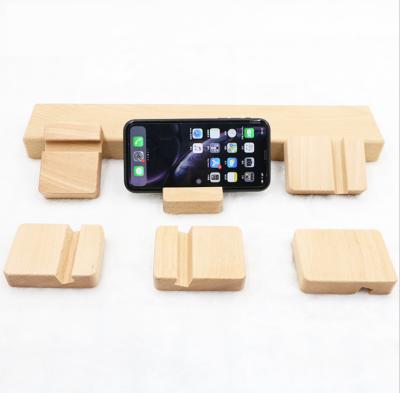 China Manufacturer High Quality Eco Friendly Beech Cell Phone Holder Universal Universal For Office for sale