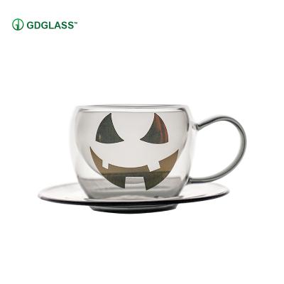 China Halloween Viable Unique Decorative Glass Mug With Handle Glass Drinking Mug for sale