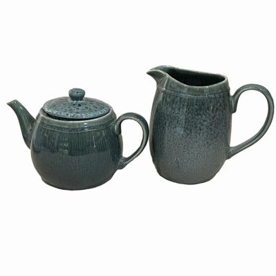 China Modern Design Viable Fashionable Color Glazed Ceramic Ceramic Glass Teapots Wholesale Porcelain Teapot for sale