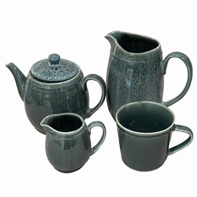 China Hot Newest Factory Price Sustainable High Quality Turned Stoneware Teapot Set Glass Teapot for sale