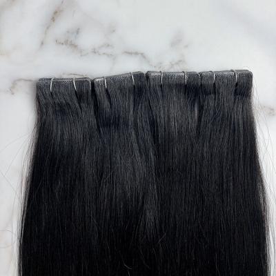 China High Quality Natural Jet Black Virgin Weft Color Skin Tone Seamless Wave Hair Grade 12a Seamless Invisible Virgin Tape In Extension for sale