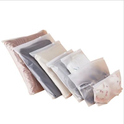 China Custom Frosted Translucency Matte Cosmetic Moisture Proof Make Up Clear Underwear Apparel Packaging Bag CPE Slider Zipper Bag for sale