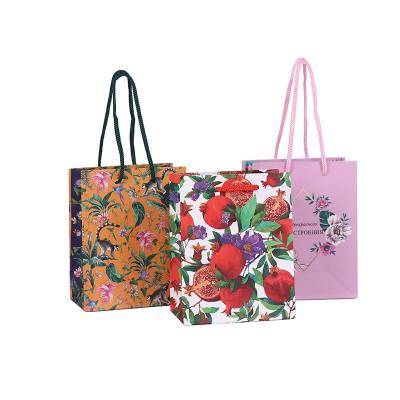 China Recycled Materials Flower New Design Custom Printed Gift Shopping Paper Bags for sale