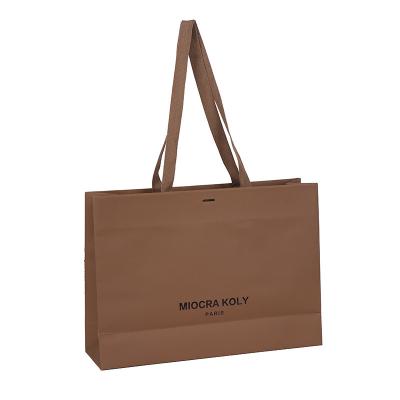 China Custom Logo Printed Paper Bag Recyclable Brown Gift Kraft Paper Bags With Handle for sale