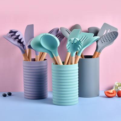 China Sustainable Wooden Handle Silica Gel Set Nonstick Cookware Pan Spatula Silicone Spatula Kitchen Utensils for sale