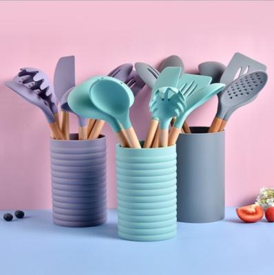 China Viable Quick Delivery Silicone Kitchen Accessories Cooking Tools Kitchen Tableware Cocina Silicone Kitchen Utensils With Wooden Handles for sale