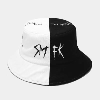 China New image graffiti splicing fisherman's hat men's and women's summer outdoor sunscreen hat street trend hip hop basin hat for sale