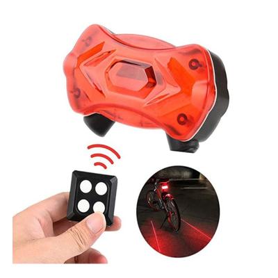 China 2021 IPX5 USB Waterproof Wireless Smart Remote Control Charge 4 in 1 Bicycle Signal Tail Light with Laser Warning Light Zxc-004 for sale