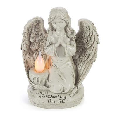 China Europe Garden Light Praying Angel Watching Over Us Solar Powered LED Outdoor Decor Resin Craft for sale