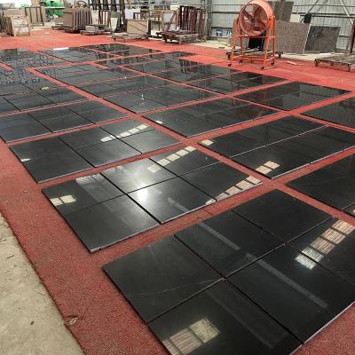 China Hotel villa lobby living room modern thick natural nero marquina marble floor 18mm black marble tile for sale