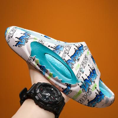 China New design fashion trend summer outdoor pure color hole beach sandals rubber shoes for men and women slippers for sale