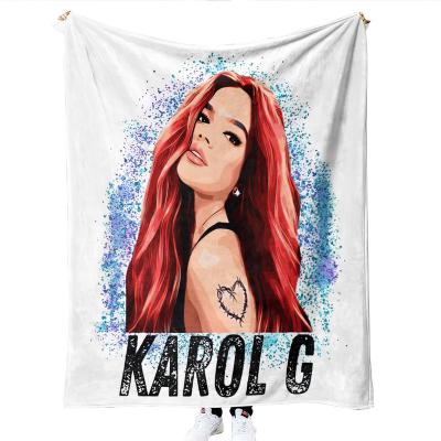 China Custom High Quality Anti-static Logo Printed Cartoon Polyester Karol G Sublimation Fleece Travel Throw Blanket for sale