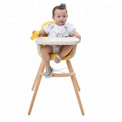 China Modern Multifunctional Wooden Baby Umpire Chair with Adjustable Tray for Baby Feeding 6 Months to 6 Years Old for sale