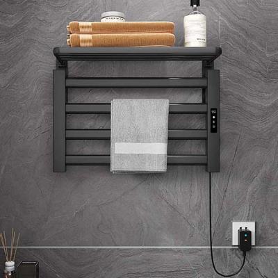 China Modern Bathroom Electric Towel Heater Rack With Shelf Wall Mounted Smart Heated Towel Heater for sale