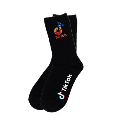 China Novelty Breathable Colorful Funny Socks Cotton Tik Tok Designer Black And White Socks For Men for sale