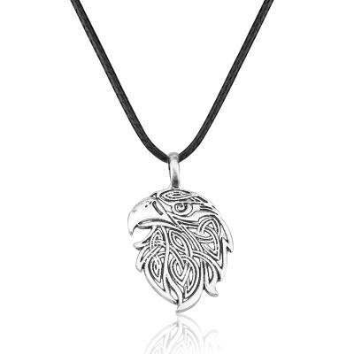 China Vintage Viking Assassin Viking Beast Imprint Eagle Head Retro Character Metallic Pendant Necklace for sale