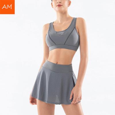 China Breathable Sexy Bilateral Waist Skirt Quick Dry Mesh Gym Sports Bra High Waisted Skirt Plain Tennis Set for sale