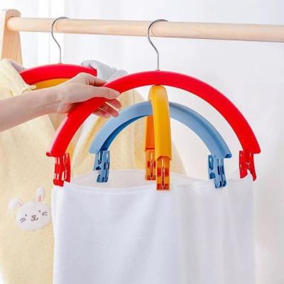 China Modern Rotary Multifunctional Space Saving Plastic Acrylic Clothing Coat Hangers With Clips for sale