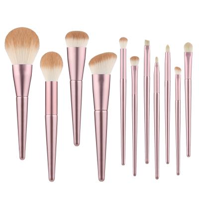 China Angular Blush Wooden Makeup Brush Set 11Pcs Super Soft Nylon Hair Makeup Brushes Light Red Handle Cosmetic Tools for sale