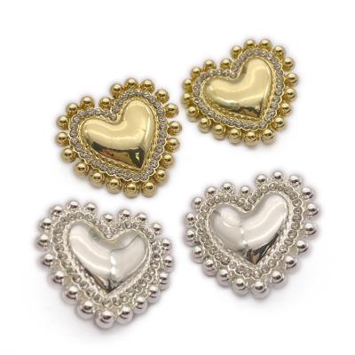 China New factory viable design heart shaped zinc alloy leg buttons for women coat custom shape and size for sale