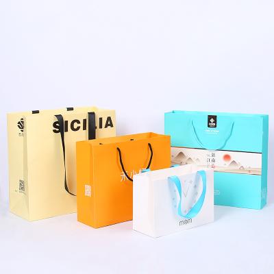 China Branded Orange Custom Luxury Recycled Logo Materials Wholesale Boutique Packaging Retail Paper Bags Euro Printed Garment Tote Bag Gift Bag for sale