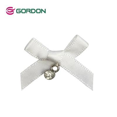 China Wholesale Viable Simple Satin Bow 9mm Mini Bow X Face Decorative Bow Ribbon For Underwear Decoration for sale