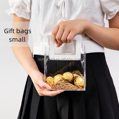 China Shock Resistance Custom Plastic Transparent Bag Clear Pvc Bag For Gift And Promotional With Handle And Button for sale